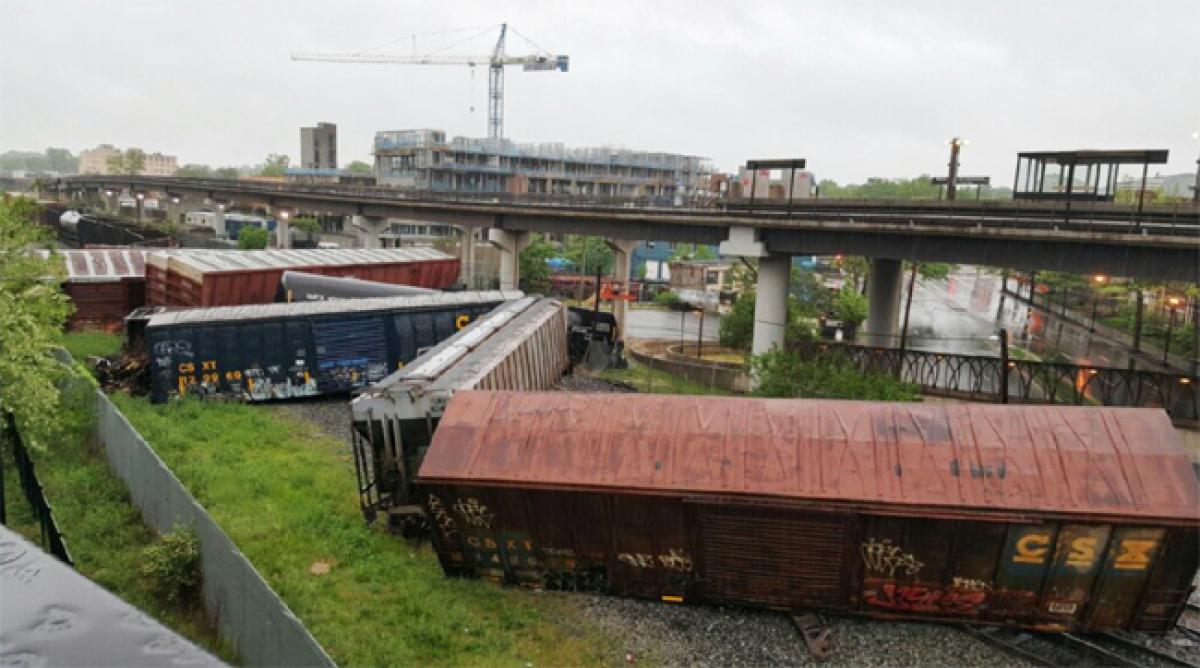 Freight train carrying hazardous material derails near Washington